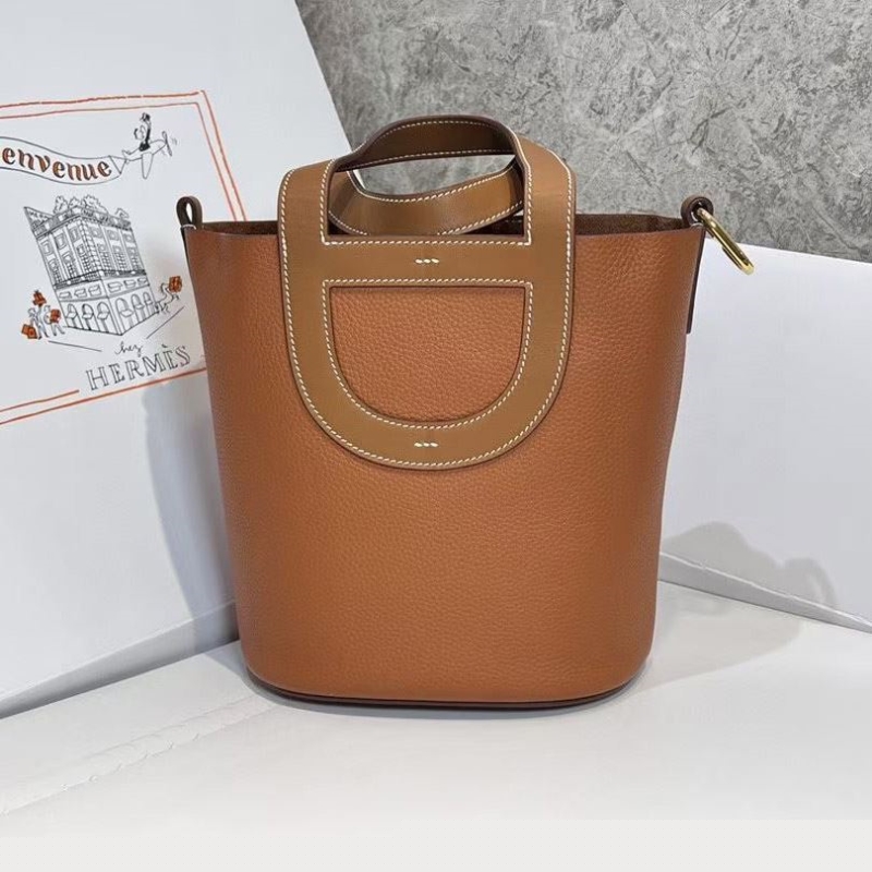 H**mes shopping bags